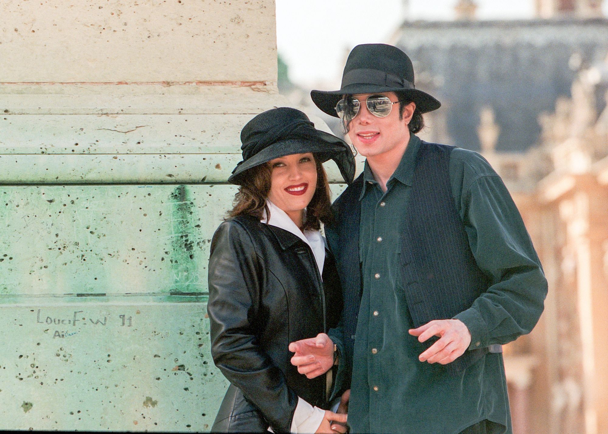 230112221245-01-lisa-marie-presley-michael-jackson-090594-obit-restricted-1673598703.jpg