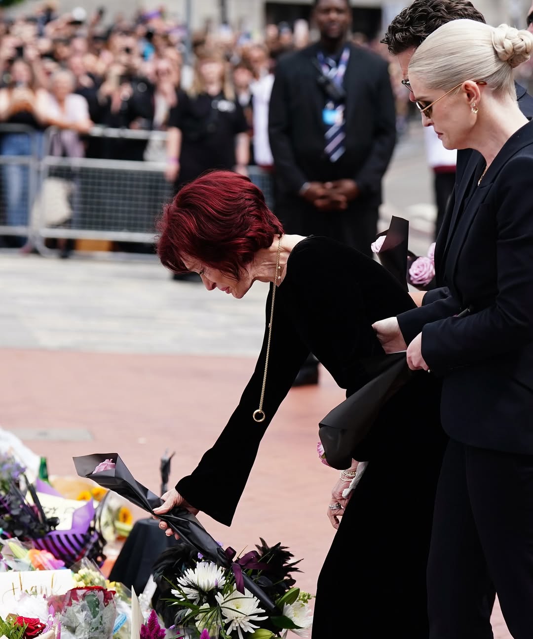 sharon-osbourne-is-comforted-by-her-children-jack-and-kelly-as-she-leads-ozzy-osbournes-funeral-1753944657.jpg